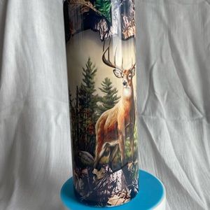 20 oz Tumbler with a big Buck and camouflage